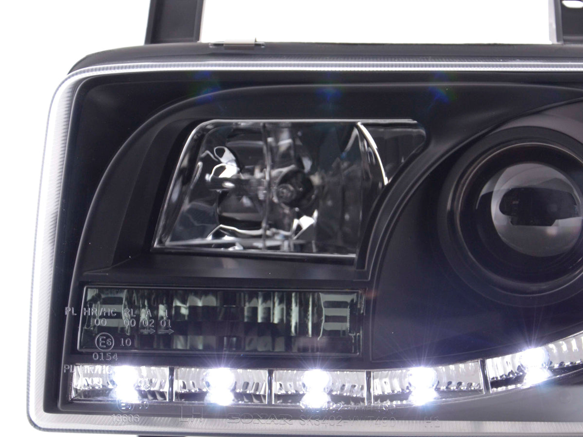 Scheinwerfer Set Daylight LED TFL-Optik VW Bus Typ T4 90-96 schwarz Scheinwerfer Set Daylight LED TFL-Optik VW Bus Typ T4 90-96 schwarz